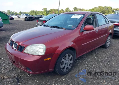 2004 Suzuki Forenza S из США, поврежденный, VIN KL5JD52Z14K969999